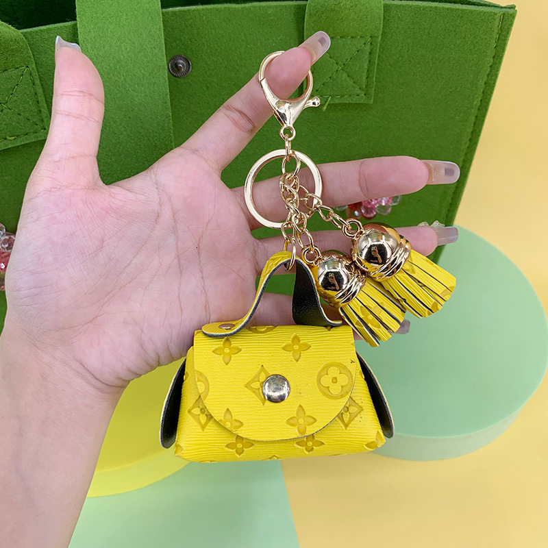 Women Leather Keychain Coin Purse - Mini Card Holder with Earphone Storage and Old Flower Pendant Key Bag Z260130