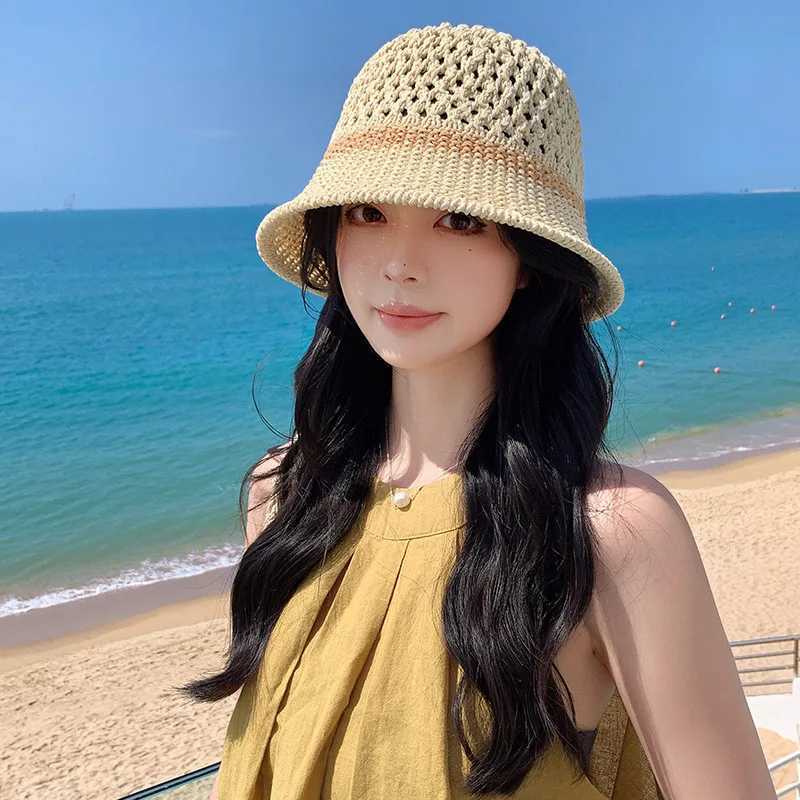 Grass woven hat versatile for wen in spring and summer hollowed out breathable sunshade basin hat fisherman hat Y250920