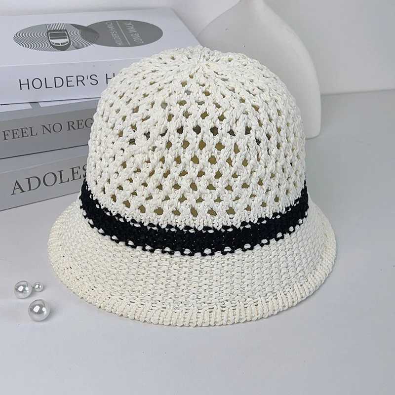 Grass woven hat versatile for wen in spring and summer hollowed out breathable sunshade basin hat fisherman hat Y250920