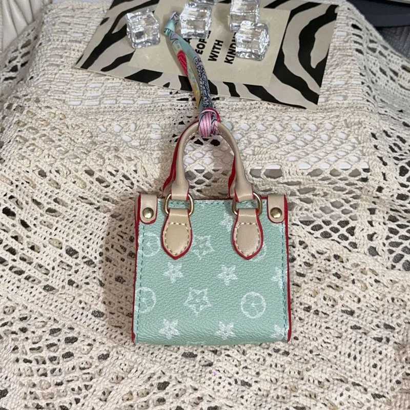 Headphone Bagoutdoor Change Lipstick Flower Shel Creative Trend Earphone Keychain Fashion Pendant Mini Bag Z250920