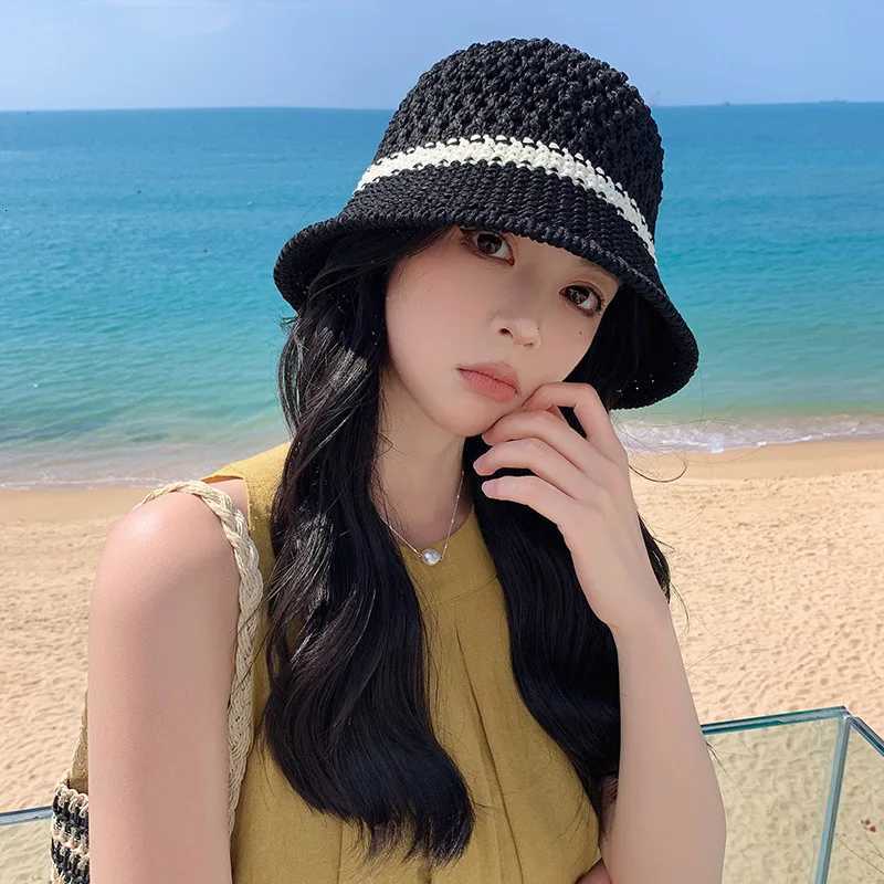 Grass woven hat versatile for wen in spring and summer hollowed out breathable sunshade basin hat fisherman hat Y250920