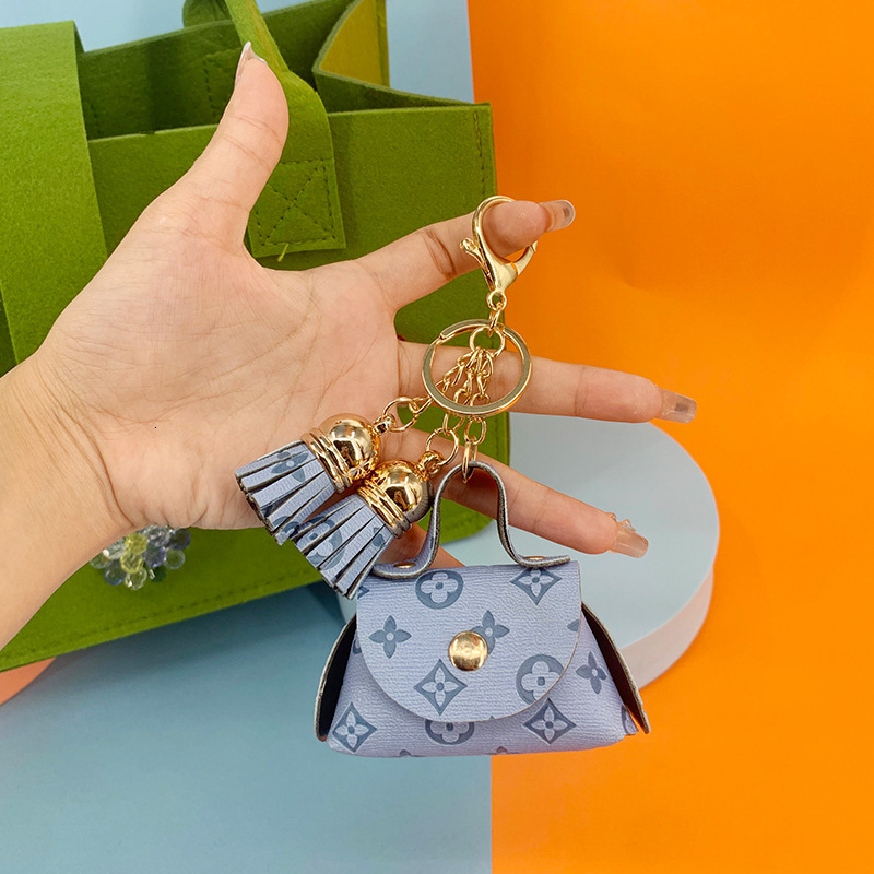 Women Leather Keychain Coin Purse - Mini Card Holder with Earphone Storage and Old Flower Pendant Key Bag Z260130