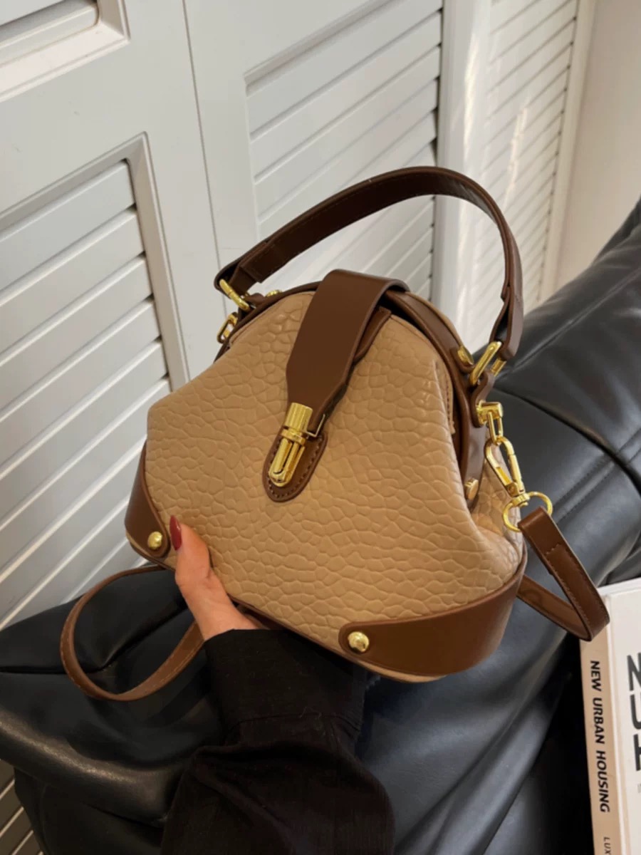 French niche bag for women, new autumn and winter versatile commuting cross-body bag, high-end sense of color collision hand bucket bag.