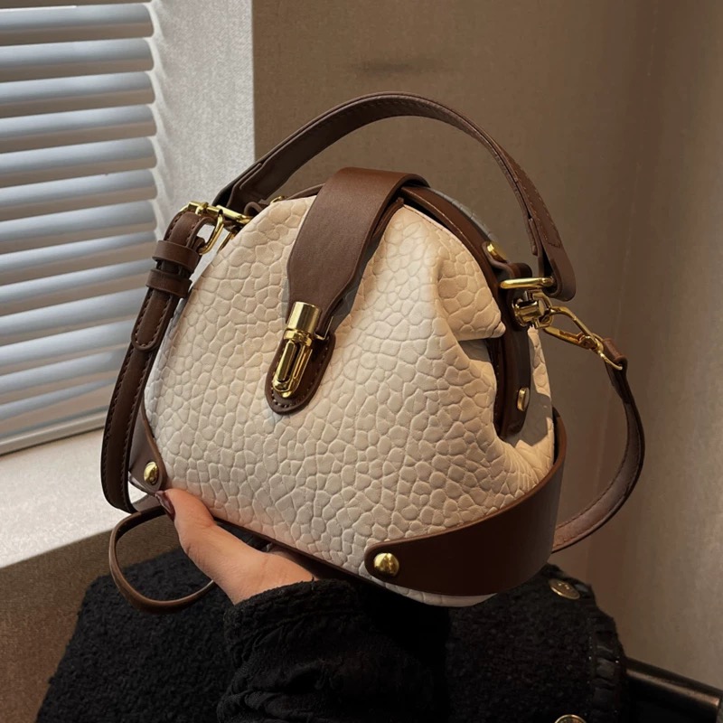 French niche bag for women, new autumn and winter versatile commuting cross-body bag, high-end sense of color collision hand bucket bag.