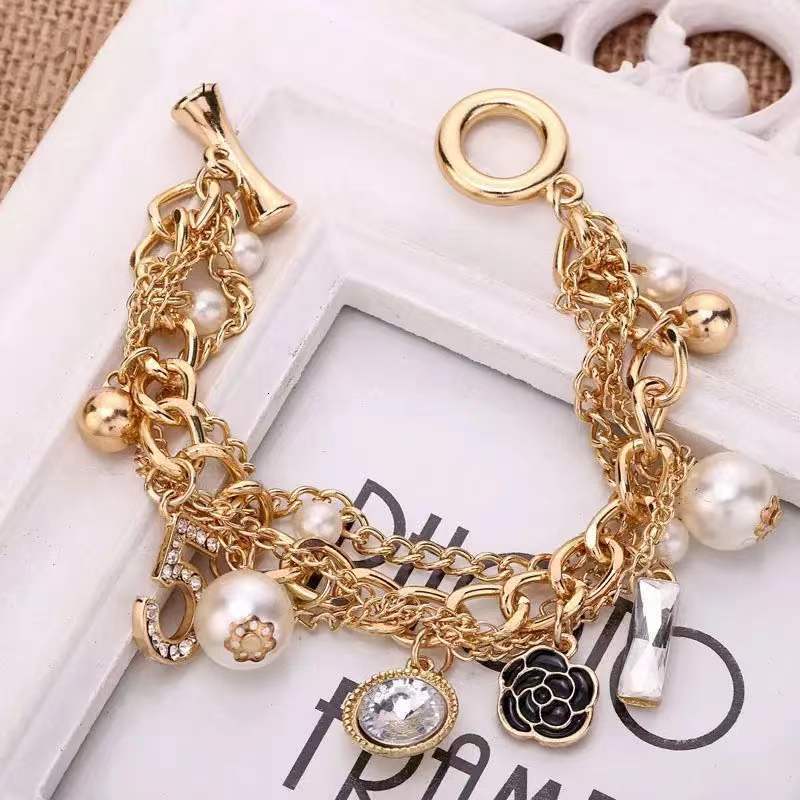 Designer Korean-style Multi-layer Bracelet, Luxury Bracelet Alloy Small Flower Inlaid Diamond Pendant Five-character European And American Jewelry Met