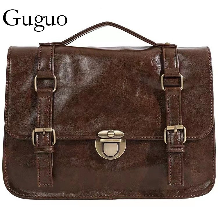 Guguo Designer Luxury Bag Bag Student Backpack Autumn Winter Vintage Buckle Messenger Bag College Style Class Bag Fashion Commuter Briefcase Crossbody