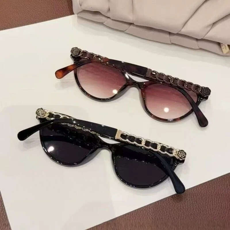 Sunglasses Designer Luxury sun glasses for women men UV400 Fashion Cat Eye eyeglasses Hollow Chain Legs Temperament Fashion Festival Holiday gifts