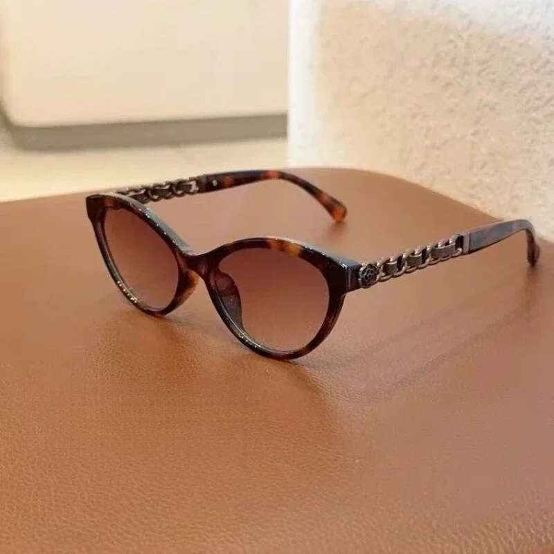 Sunglasses Designer Luxury sun glasses for women men UV400 Fashion Cat Eye eyeglasses Hollow Chain Legs Temperament Fashion Festival Holiday gifts