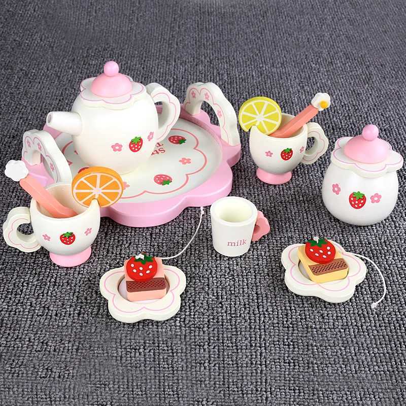 White tea set with cups teapots sugar jars trays plates spoons milk cups and other simulated home toys C250922