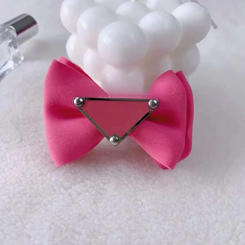 2025 new Designer Brand Apparel Cute Puppy Dog Small Bowknot Bows with Metal Clips Handmade Hair Accessories Bow Pet Grooming Products Purpl