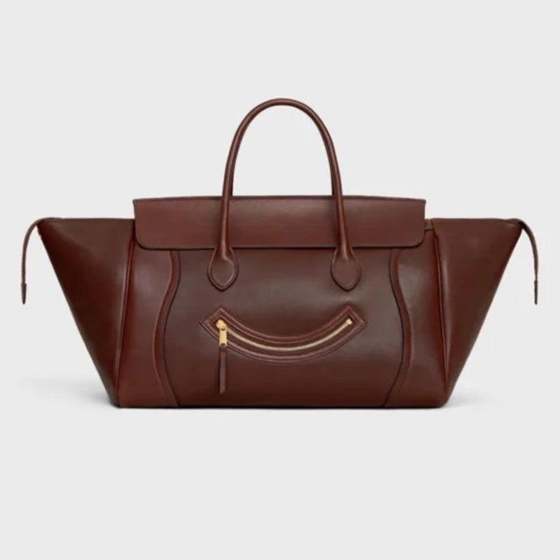 Handbag new smile wing bag large capacity soft leather temperament bag woman simple commuter tote bag woman