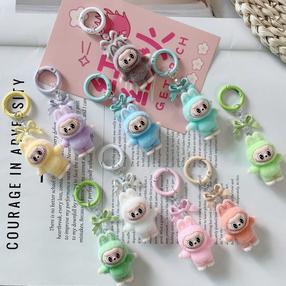 New Mini Labubu Kawaii Particle Bow Keychain Creative 3D Doll Bag Phone Charm Keychain Male and Female Gifts M250923