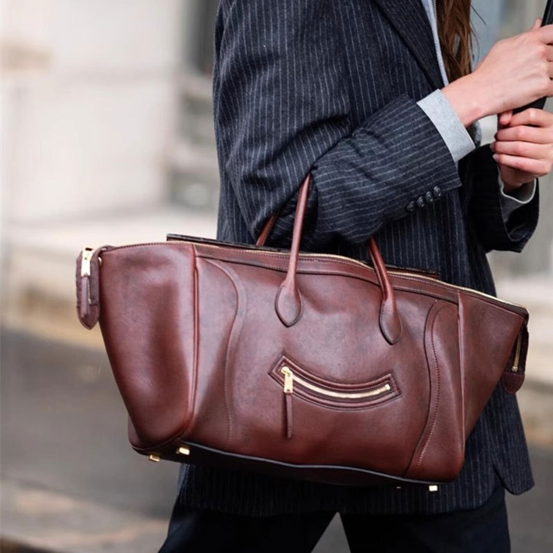 Handbag new smile wing bag large capacity soft leather temperament bag woman simple commuter tote bag woman