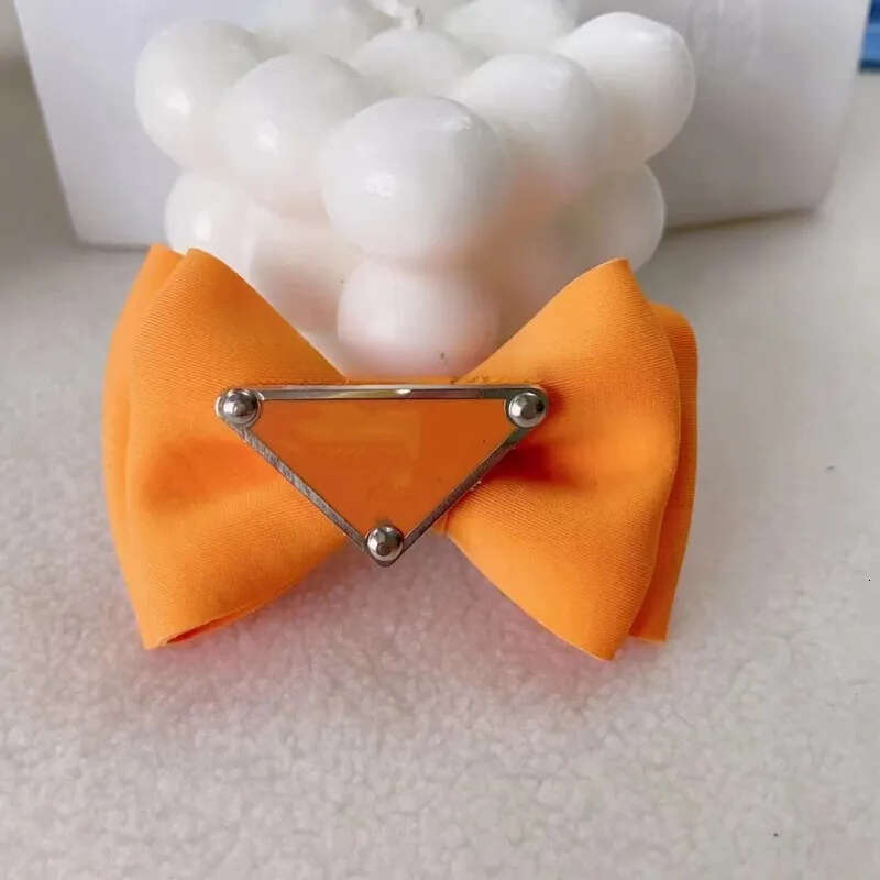 2025 new Designer Brand Apparel Cute Puppy Dog Small Bowknot Bows with Metal Clips Handmade Hair Accessories Bow Pet Grooming Products Purpl