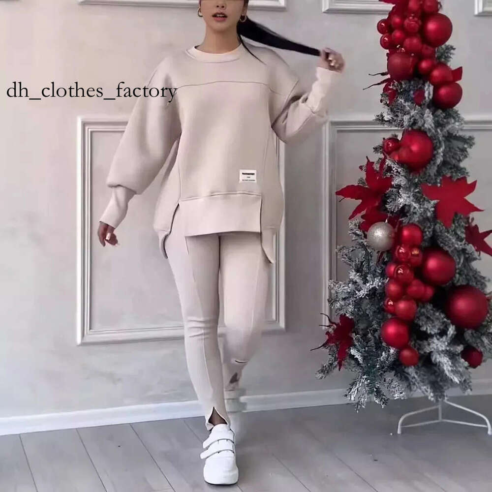 2pcs Femmes Sport Costume Sweat-shirt Sweat-shirt hiver lâche des leggings irréguliers Pant de jogging décontracté Sports Two-Piece Set I240930 C