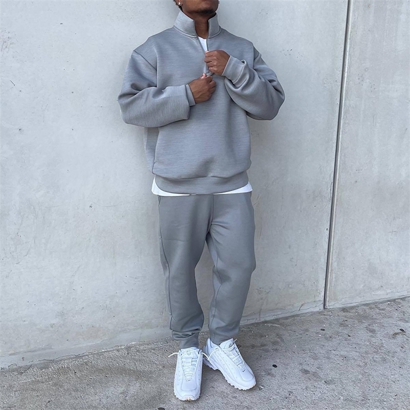 Men's Tracksuits Casual solid color loose fitting men's track suit Spring casual long sleeved bracket collar top and pants two-piece set for