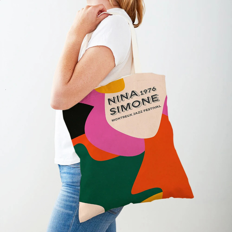 The music poster features performances by various bands shopping bags double printing casual Nordic womens canvas handbags and 240820