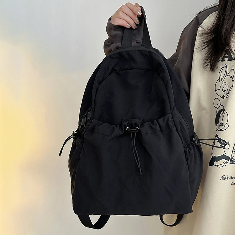 Large capacity school backpack for both boys and girls nylon drawstring lightweight with side pockets suitable travel sports 240906