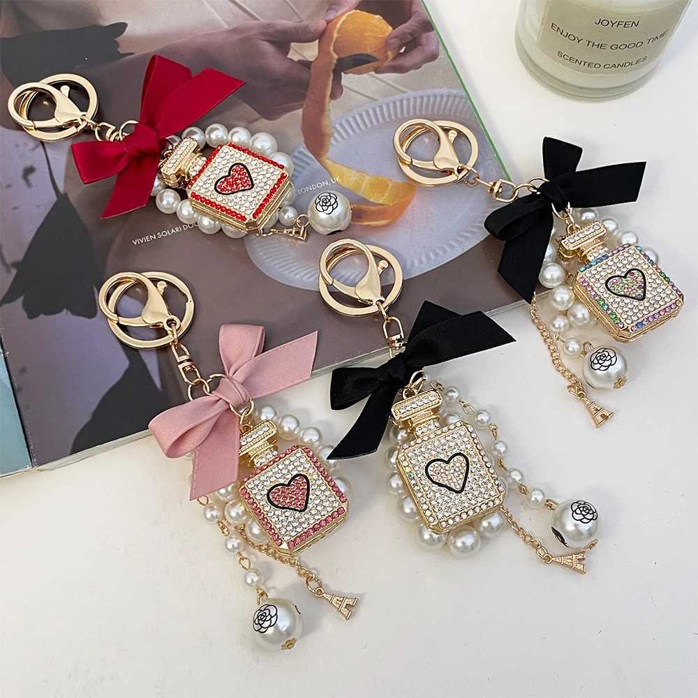 Fashion 1Pc Elegant Artificial Pearl Perfume Bottle Keychain With Bowknot Faux Pearl Charm Perfect Chic Accessory For Car Keys Handbags7 D250925