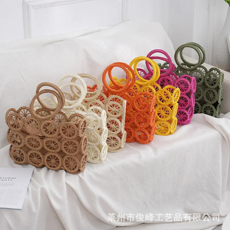 Paper rope woven wheel bag crossed boundary hollow large capacity circular tourism beach handbag 241014