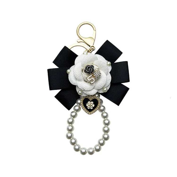 Fashion Creative Thread Camellia Flower Key Chain Pearl Chain Fashion Personality Bag Pendant for Women Car Keychain Accessories6 D250925