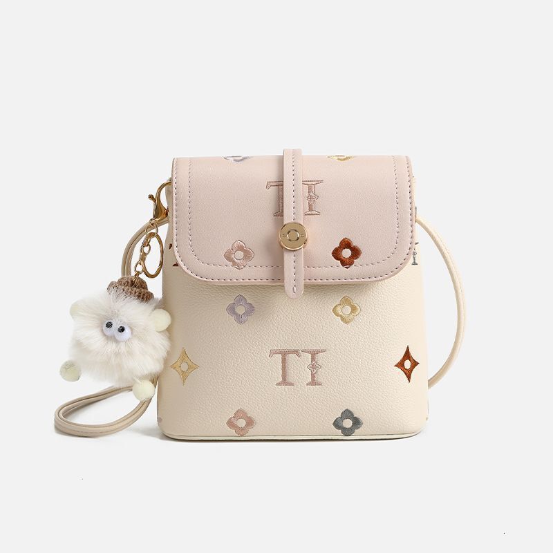 Light luxury ethnic embroidery hand-held crossbody bag, mobile phone bag bucket bag, new evening dress women's bag niche designer bag