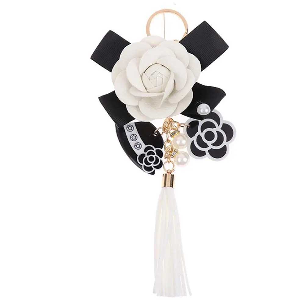 Fashion Valentines Gifts Leather Jewelry Gifts Bag Ornaments Element Hanger Bag Pendant Key Chain Camellia Key Chain Flower Keyring2 D250925