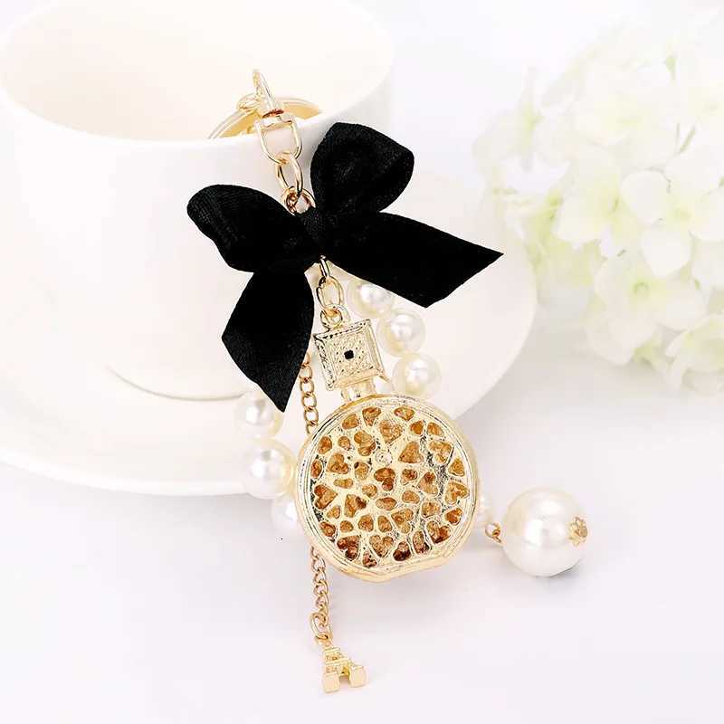 Fashion Elegant Perfume Bottle Keychain For Women and Girls BowKnot Faux Pearl Cute Handbag Key Chain Car Creative Gift White D250924