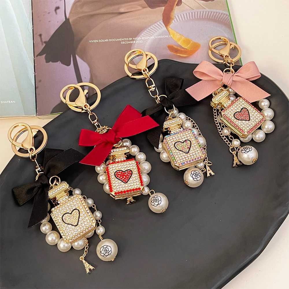 Fashion 1Pc Elegant Artificial Pearl Perfume Bottle Keychain With Bowknot Faux Pearl Charm Perfect Chic Accessory For Car Keys Handbags7 D250925