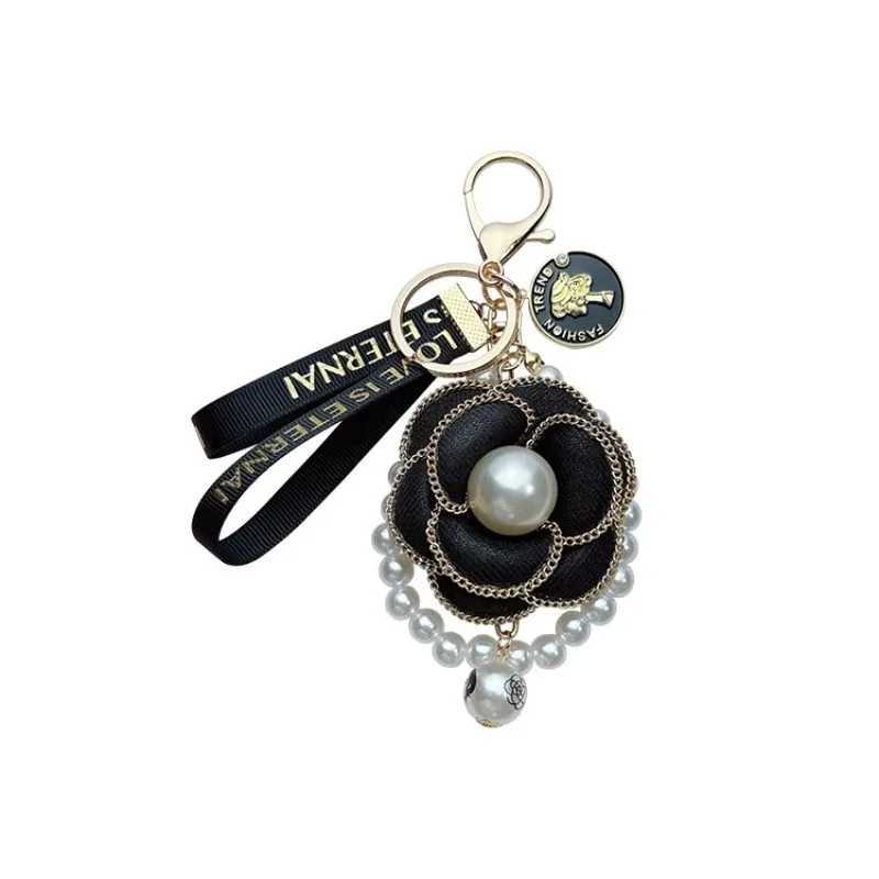 Fashion Pearl String Camellia Keychain Fashionable and Personalized Bag Pendant1 D250925
