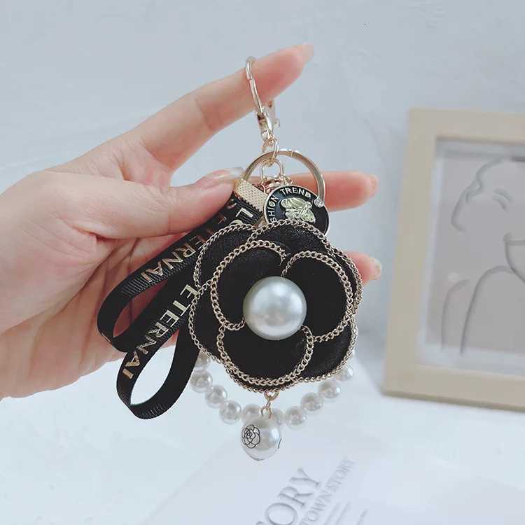 Fashion Pearl String Camellia Keychain Fashionable and Personalized Bag Pendant3 D250925
