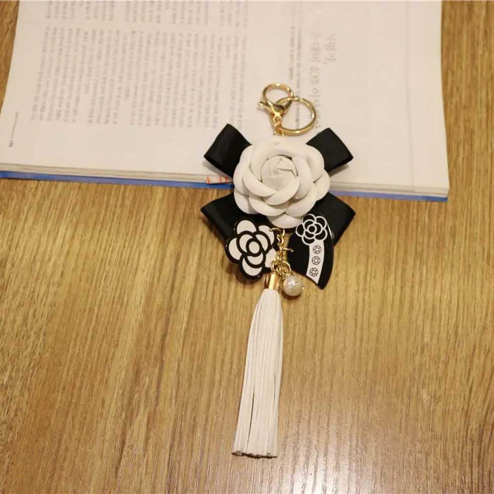 Fashion Luxury Bag Black White Woman Camellia Keychain Plush Car Camellia Bags key chain Car Key Ring Bag Ornaments D250924