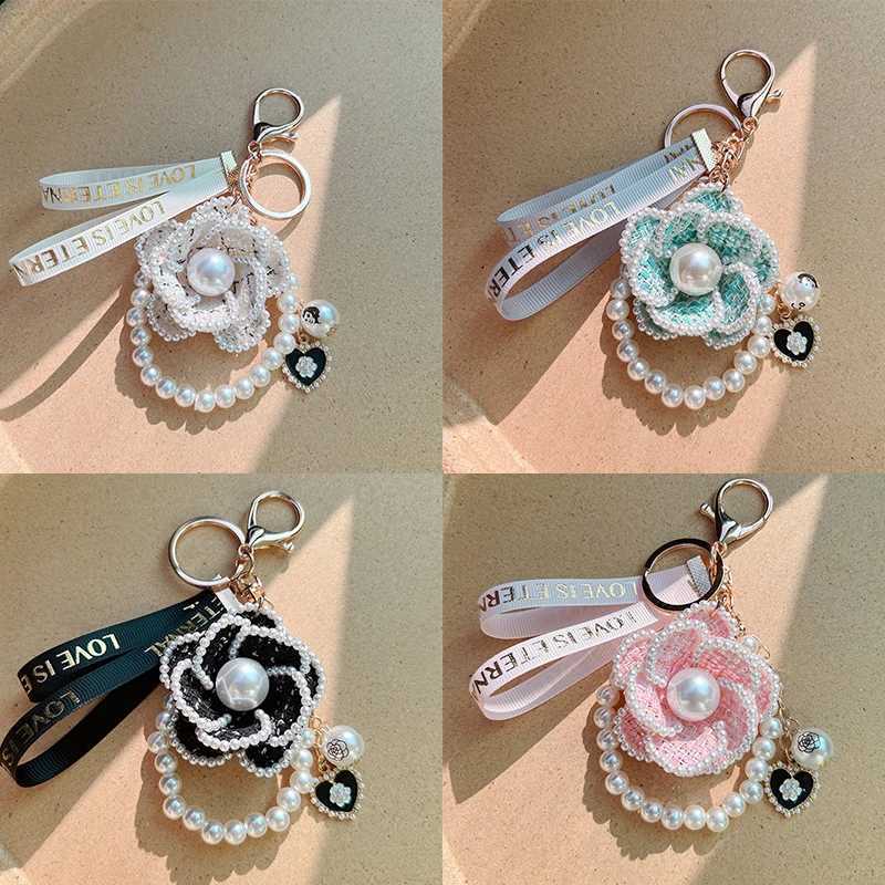 Fashion Boutique Fabric Ribbon Women Jewelry Pearl Chain Handmade Camellia Keychain Car Key Ring Bag Pendant Accessories Keyring Gift D250925