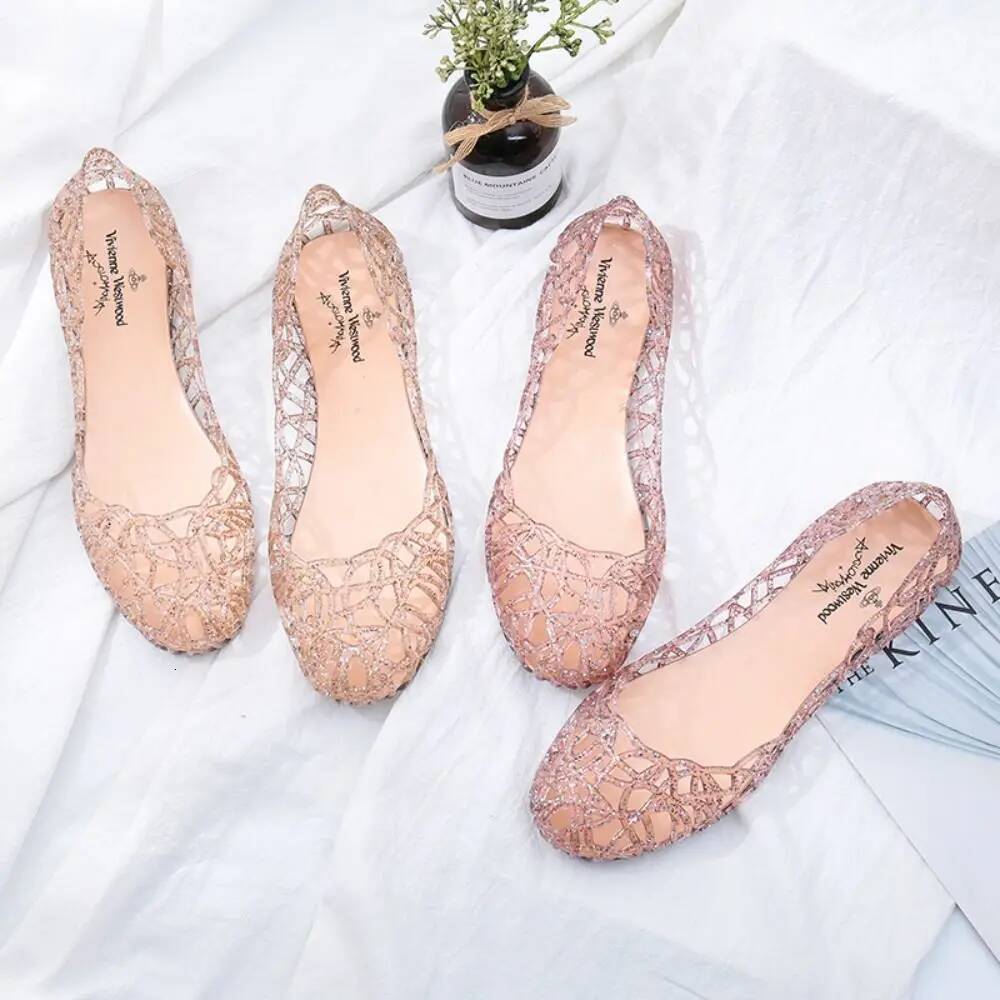 Casual Flat-soled Women Hollow Out Clear Beach Jelly Shoes Breathable Shallow Mouth Bling Sandals Ladies ddmypanda