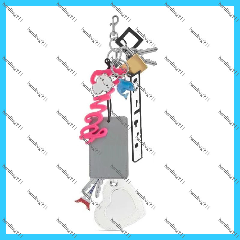 Keychains Lanyards 24B rodeo charm New Rodeo Keychain One Shoulder Smooth Calf Leather Handheld Women Bag With Underarm Lock Buckle For Leisure Commuting Womens Bag