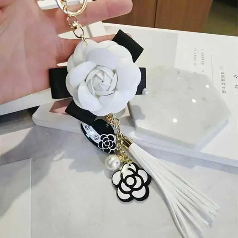 Fashion Korean Trendy Leather Bag Camellia Keychain Long Tassel Car Hanger Flower Key Chain Element Jewelry Hanger D250925