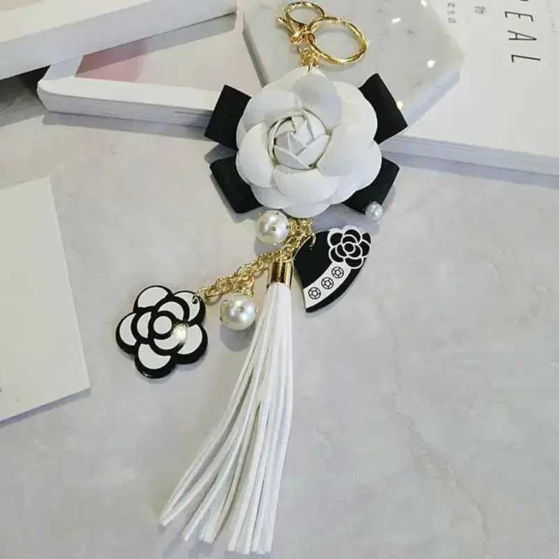 Fashion Korean Trendy Leather Bag Camellia Keychain Long Tassel Car Hanger Flower Key Chain Element Jewelry Hanger D250925