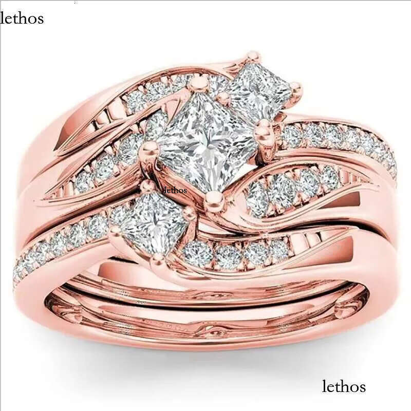 DHcollections Rose Gold Plated Simulated Dia Micro Set With Zircon Three Engagement Ring 7f