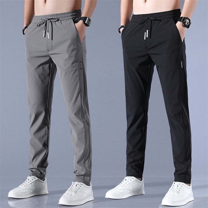 Men's Pants Men's Ice Silk Trousers Solid Color Mid-Waist Loose Breathable Straight-Leg Casual Pants Thin Quick-Drying Sports Pants 230425