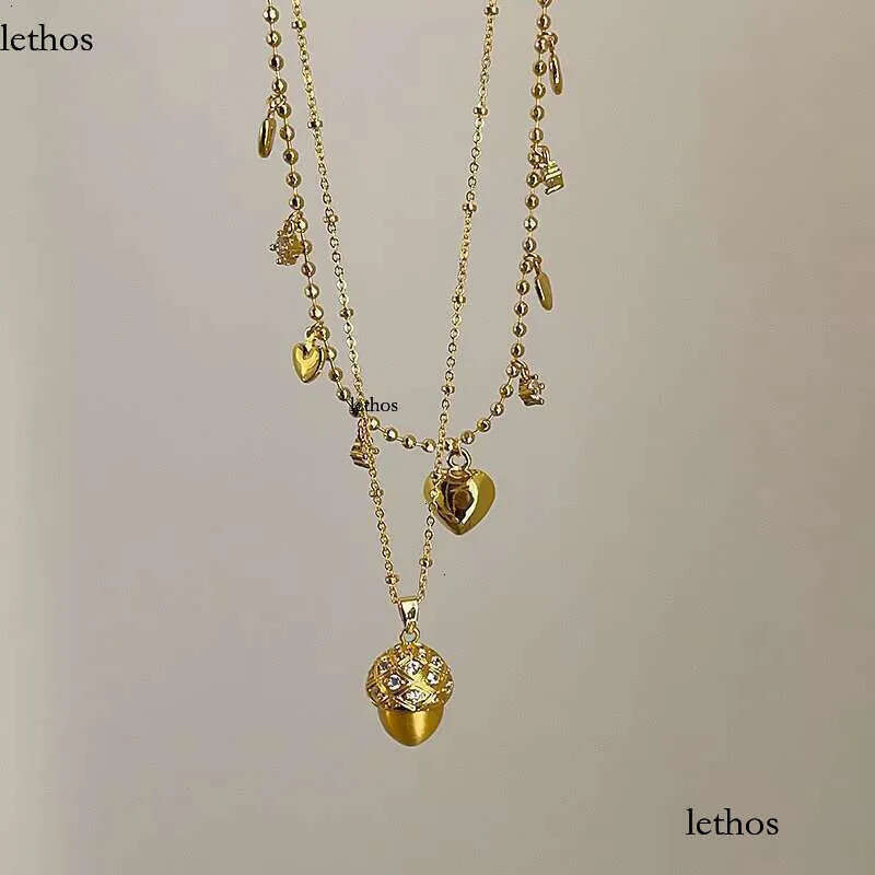 DHCollection Pinecone Heart Pattern Gold Plated Cubic Zirconia Ins Vintage Pendant Necklace Fashion Jewelry 11