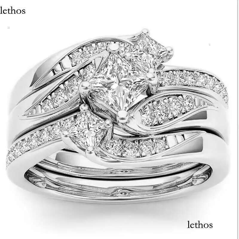 DHcollections Rose Gold Plated Simulated Dia Micro Set With Zircon Three Engagement Ring 7f