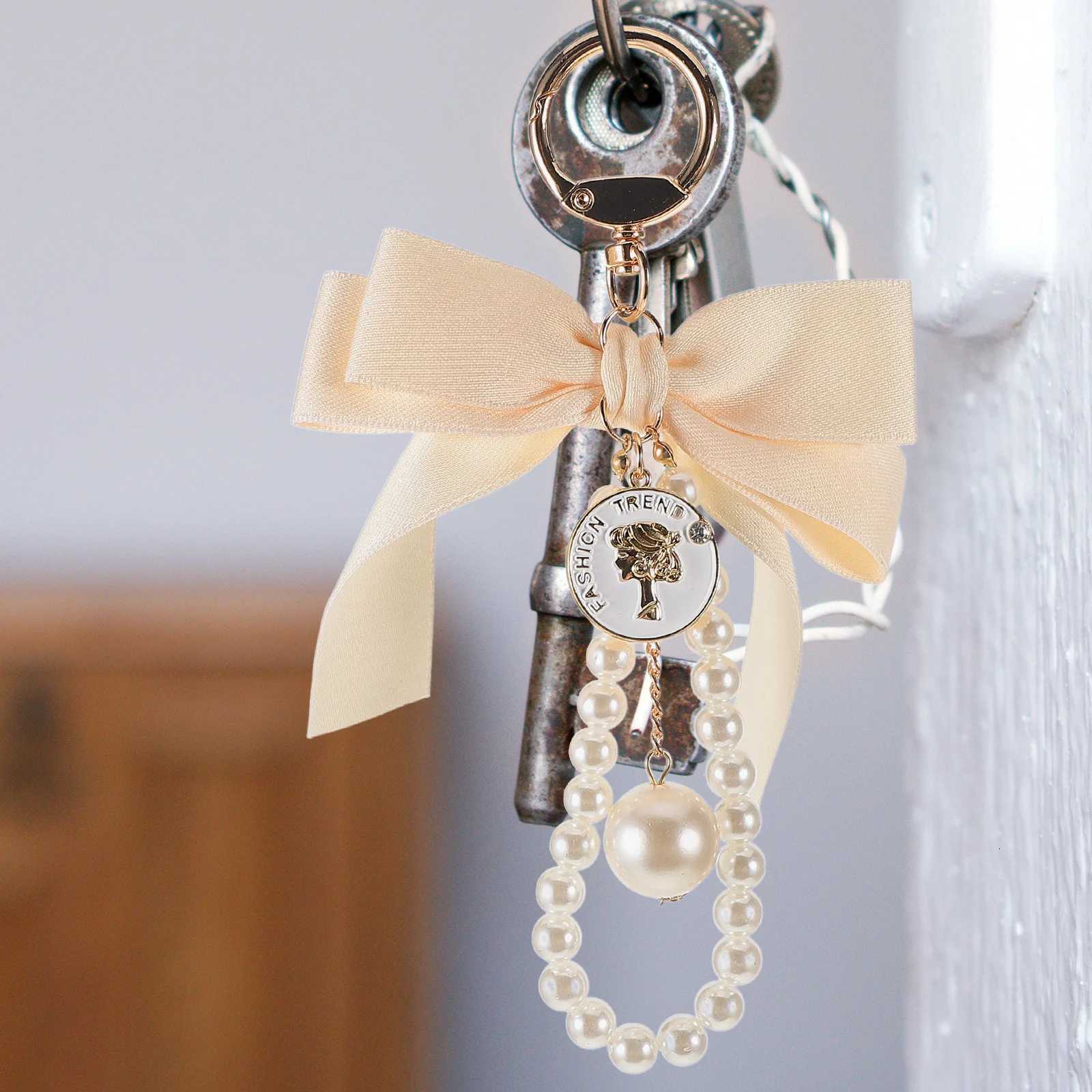 Fashion Bowknot Pearl Keychain For Women Korea Bag Accessories Womens Car Pendant Phone Chains DIY Accessories Lanyard Fashion Jewelry12 D250925