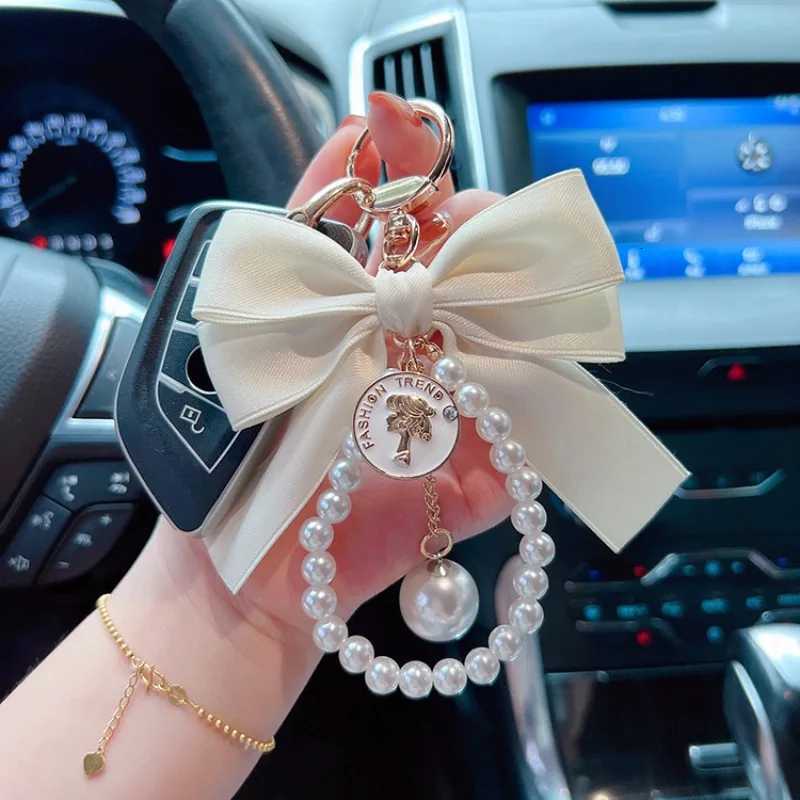 Fashion Fashion Big Bow Tie Key Chain Pearl Chain Womens Car Pendant Statement Tote Hanging Ornament1 D250925