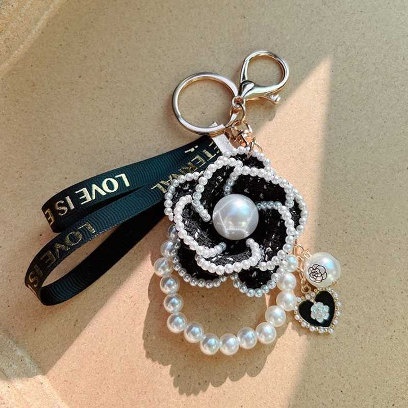 Fashion Fashion Boutique Jewelry Pearl Chain Handmade Camellia Flower Keychain Car Key Ring Bag Pendant Accessories Women Keyring Gift11 D250925