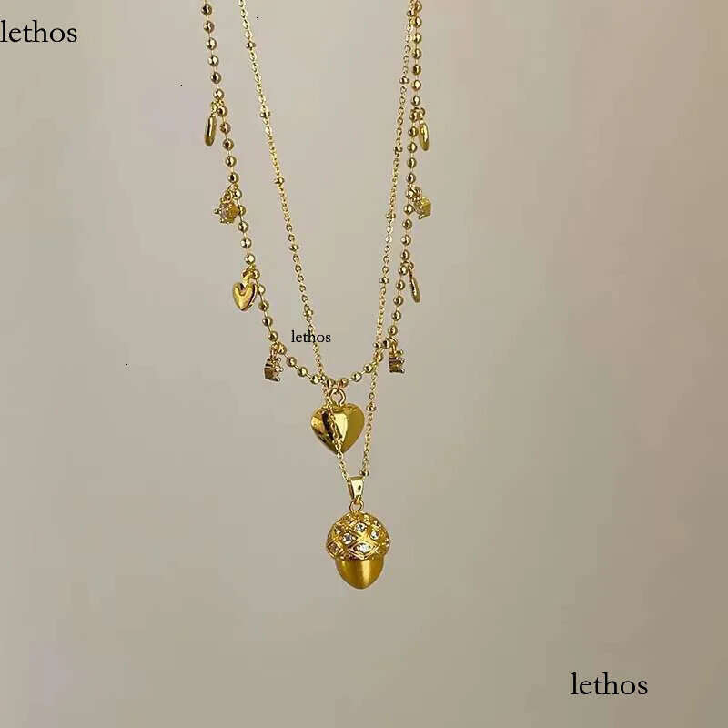 DHCollection Pinecone Heart Pattern Gold Plated Cubic Zirconia Ins Vintage Pendant Necklace Fashion Jewelry 11