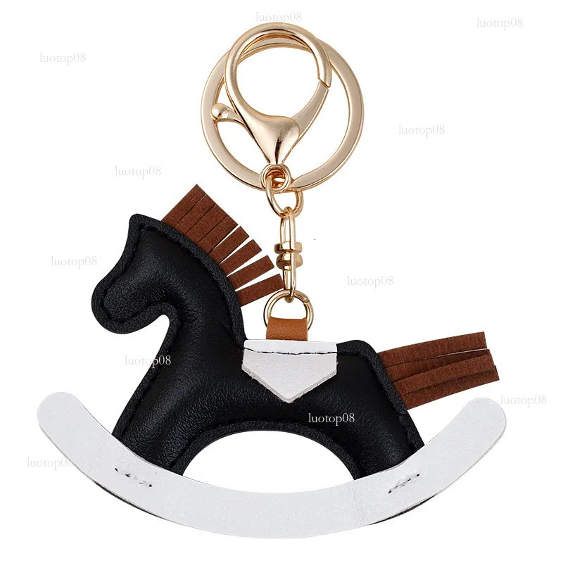 key chain designer crazy Ins pony cartoon rocking horse handmade leather bag pendant car keychain wallet