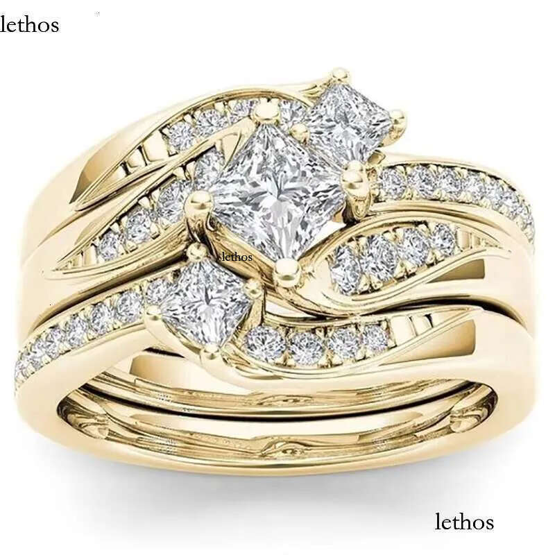 DHcollections Rose Gold Plated Simulated Dia Micro Set With Zircon Three Engagement Ring 7f