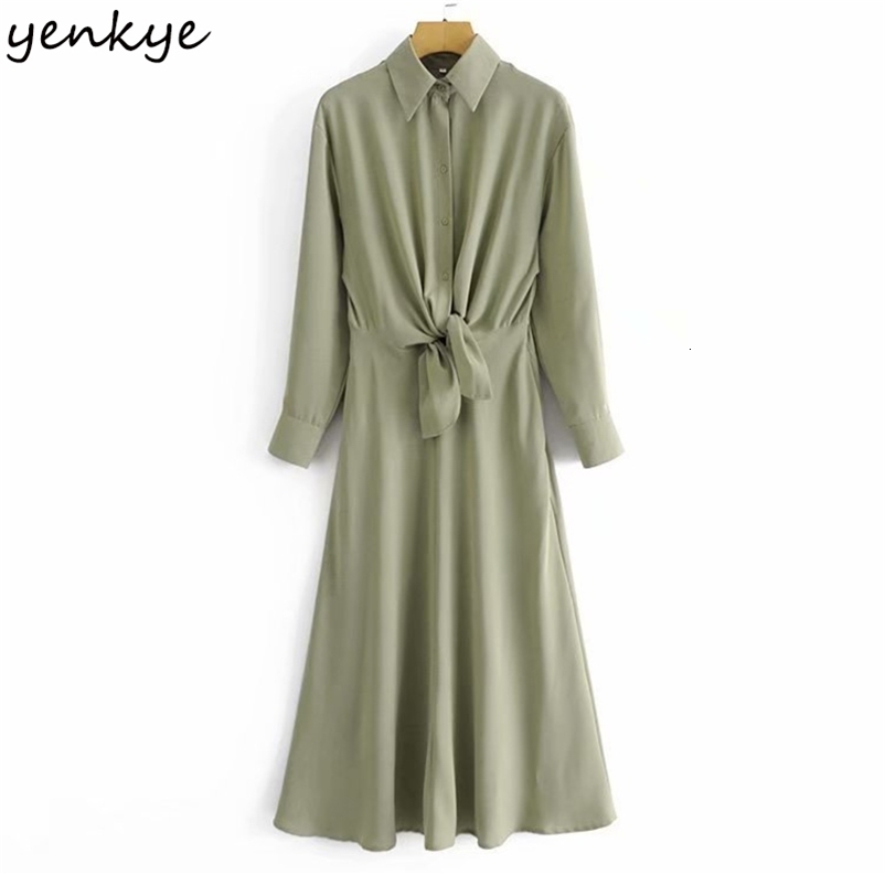 YENKYE Vintage Solid Color Long Maxi Dress Women Front Knot Long Sleeve Lapel Collar A-line Casual Winter Dress Plus Size Robe 210515