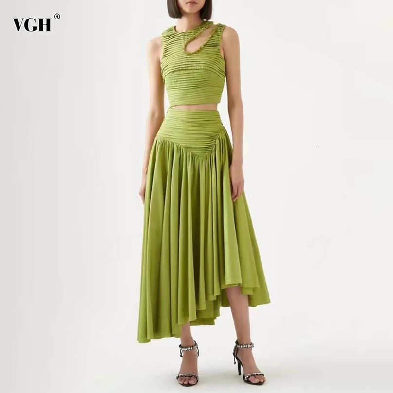 VGH ultrathin womens twopiece round neck sleeveless hollow pleated crop top irregular hem leather solid set 240810