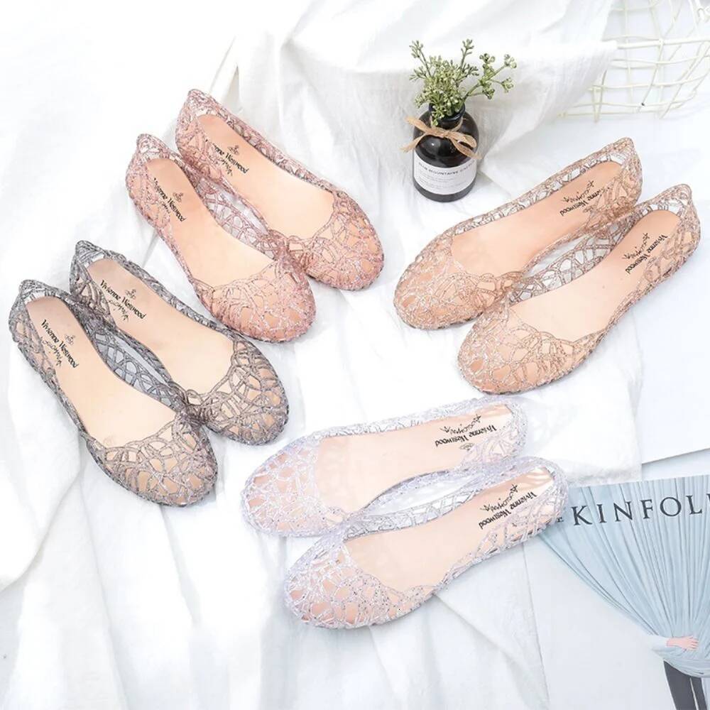 Casual Flat-soled Women Hollow Out Clear Beach Jelly Shoes Breathable Shallow Mouth Bling Sandals Ladies ddmypanda